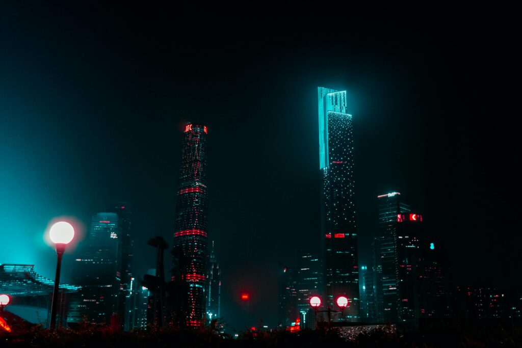 pexels-photo-1366957-1366957 Stunning night view of Guangzhou's skyline with brightly lit skyscrapers creating a mesmerizing urban landscape.